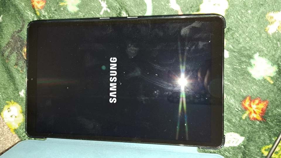 Samsung Galaxy Tab серый с синим чехлом - Изображение 1 из 4