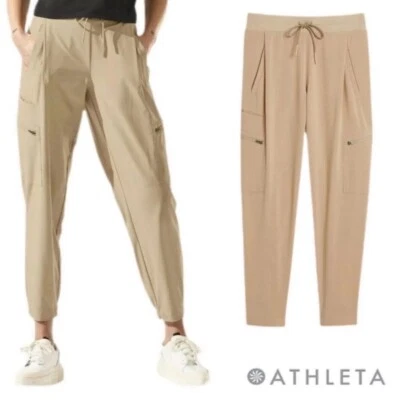 Athleta Go Far Travel Pant Joggers Drawstring Zip Pockets Tan Size 12 - Image 1 of 4