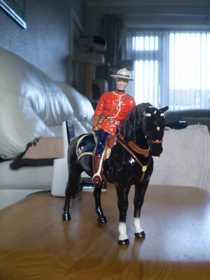 Beswick Canadian Mountie Model No 1375 Black Horse Gloss. - Image 1 of 4