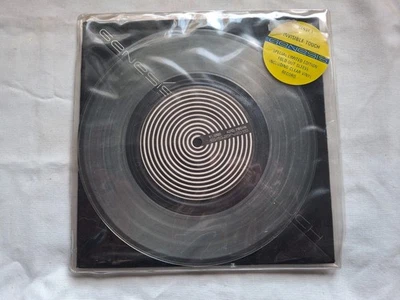 GENESIS INVISIBLE TOUCH  CLEAR FOLD OUT  1986 VINYL UK  7" P/S MINT- - Image 1 of 2