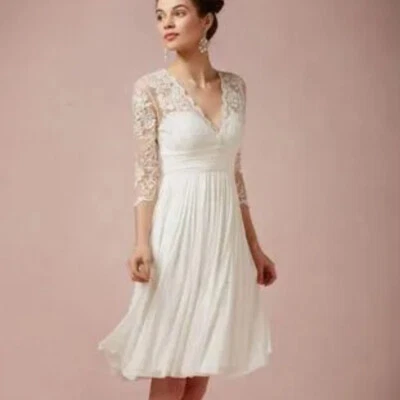 Vestidos de novia cortos de gasa con cuello en V apliques de encaje sin espalda volantes vestidos de novia Foto 1 de 4