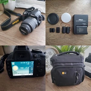 Nikon D3100 DSLR Camera with 18-55mm Zoom Lens, Strap, Bag, Charger + Extras - Picture 1 of 19