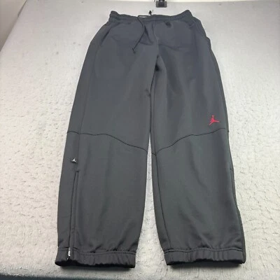 Pantalones deportivos Air Jordan para hombre medianos negros cónicos rendimiento deportivo Foto 1 de 4