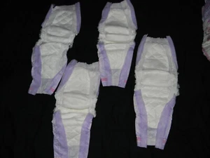 20 Huggies 5t-6t , These TABS has been cut off you can use them as booster pad - Picture 1 of 5