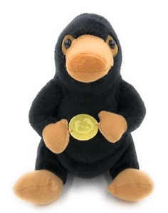 Animales Fantásticos Niffler con Moneda 7” Peluche Harry Potter Mundo Mágico - Imagen 1 de 4