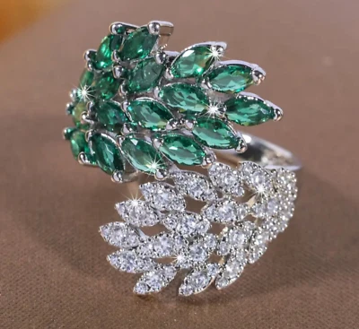 Коктейльное кольцо с симулированным изумрудом фианитом и искусственными бриллиантами листьями серебристое размер 9 - Изображение 1 из 4