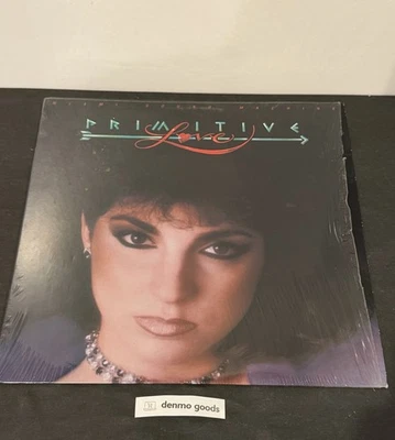 MIAMI SOUND MACHINE PRIMITIVE LOVE EX LP ORIG 1985 IN SHRINK FREE SHIP - Image 1 of 4