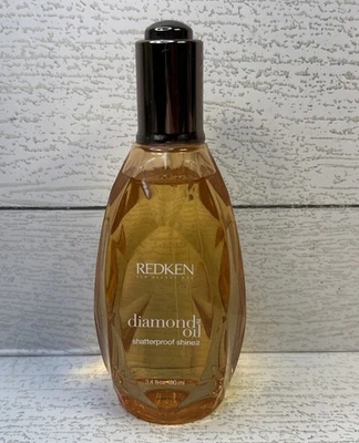 Suero irrompible Redken Diamond Oil 3,4 fl oz descontinuado, nuevo sin caja Foto 1 de 3
