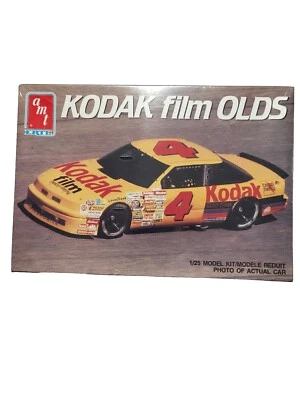 Vintage Amt Kodak Film Olds. 1/25 Scale Car Model Kit Brand New At34 Years... - Image 1 of 4