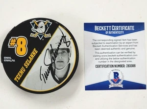 Teemu Selanne & Paul Kariya signed Anaheim Ducks Puck autograph (A) Beckett BAS - Picture 1 of 3