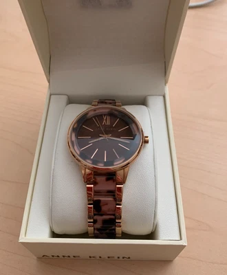 Reloj de vestir de cuarzo japonés para mujer Anne Klein (modelo: AK/1412TORG) tortuga Foto 1 de 4