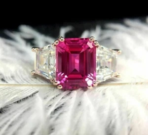 3Ct Emerald Cut Lab Created Pink Ruby Three Stone Ring In 14K Rose Gold Finish - Picture 1 of 5