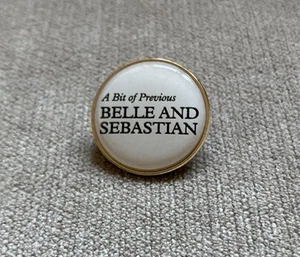 Belle And Sebastian Metal Pin Badge Rate and New - Picture 1 of 2