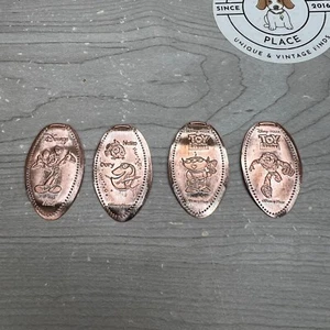 DISNEY PARKS Pressed Penny Lot Mickey Nemo Toy Story DS Set Elongated Coins New - Picture 1 of 6