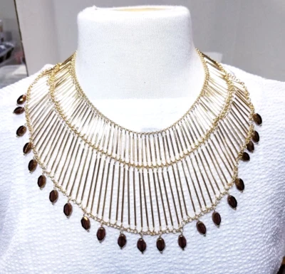 Collar babero llamativo tono dorado de Chico's Foto 1 de 4