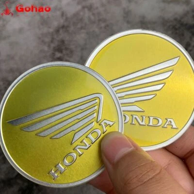 Par de emblemas de insignia de tanque guardabarros carenado dorado de 6 cm L/R para CB CBR CBF CL CM PCX NT Foto 1 de 4
