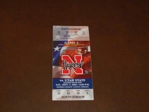 2002 UTAH STATE AT NEBRASKA FOOTBALL BIGLIETTO COMPLETO RICHIESTE INCOGNITO - Foto 1 di 2