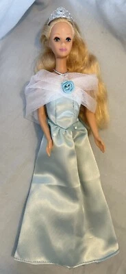 Vintage Sleeping Beauty Barbie doll in different clothes, eyes open and close - image 1 of 4