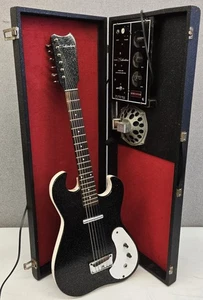 Silvertone Solid Body E-Gitarre Modell 1448 mit Koffer Verstärker Schwarz... - Bild 1 von 24