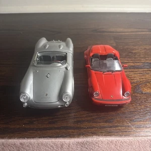 Lote de 2 SD Maisto Porsche 550A Spyder y 911 Speedster (1989) escala 1:18 - Imagen 1 de 6