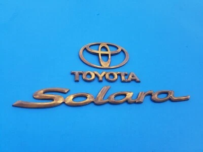 99 00 01 02 03 TOYOTA SOLARA EMBLEMA DORADO TRASERO INSIGNIA SÍMBOLO LOGOTIPO CONJUNTO OEM (2001) Foto 1 de 4