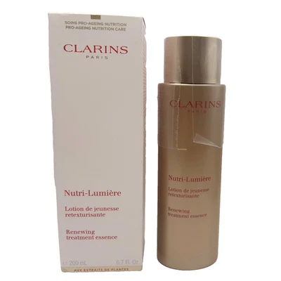 CLARINS Nutri Lumiere Esencia Tratamiento Renovador 6.7oz SIN SELLO  Foto 1 de 4