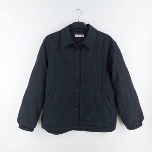 Giacca imbottita trapuntata oversize nera Uniqlo x J W Anderson taglia media (veste L) - Foto 1 di 12