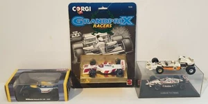 AUTOS: 4er SET FORUMAL 1 RENNWAGEN VON CORGI-MATTEL / ATLAS - Bild 1 von 11