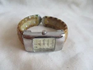 Denacci Analog Wristwatch with a Cuff Band and Quartz Movement - Picture 1 of 12