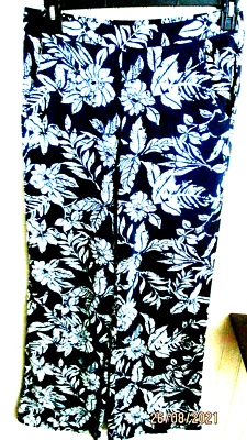 HH.  A BYER ladies size M soft stretch long pants BLACK / WHITE. FLORAL - Image 1 of 2