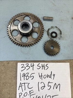 1985 Honda ATC 125 M engine starter motor gears 334 Foto 1 de 4