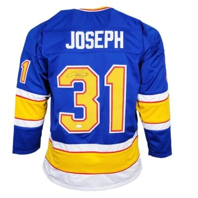 Camiseta deportiva de hockey azul firmada por Curtis Joseph de St. Louis (JSA) Foto 1 de 2