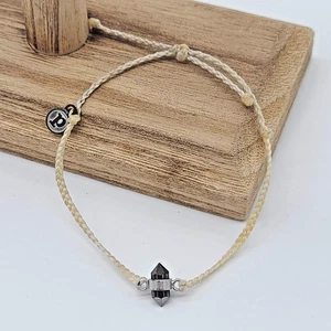 Pulsera Pura Vida Bitty trenzada cordón vainilla facetado hematita cilindro - Imagen 1 de 7