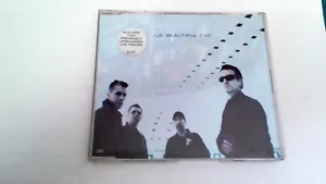 U2 "BEAUTIFUL DAY" CD SINGLE 3 TRACKS COMO NUEVO - Foto 1 di 2