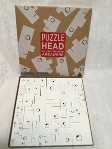 Areaware Puzzle Kopf von Richard McGuire Holz Knobelspiel - Bild 1 von 4