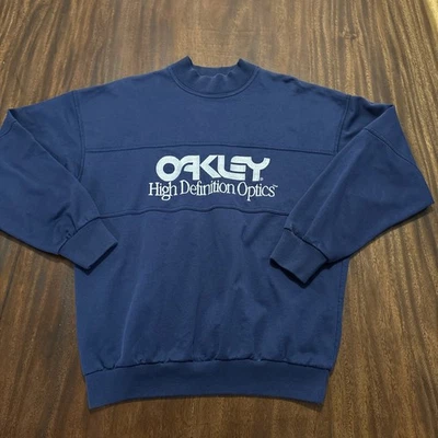 Sudadera Oakley High Definition Optics Vintage Años 80 Cuello Redondo Talla XL Azul Foto 1 de 4