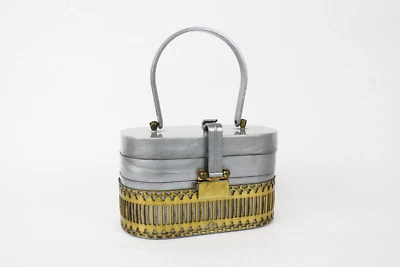 Cartera Lucite gris jaspeado con jaula de latón Foto 1 de 4