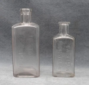 PAIR OF ANTIQUE EASTMAN (KODAK) GLASS CHEMICAL BOTTLES - Picture 1 of 3