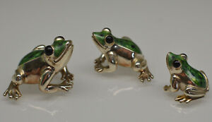 a good set of 3 graduated Saturno hallmarked Sterling silver & enamel frogs