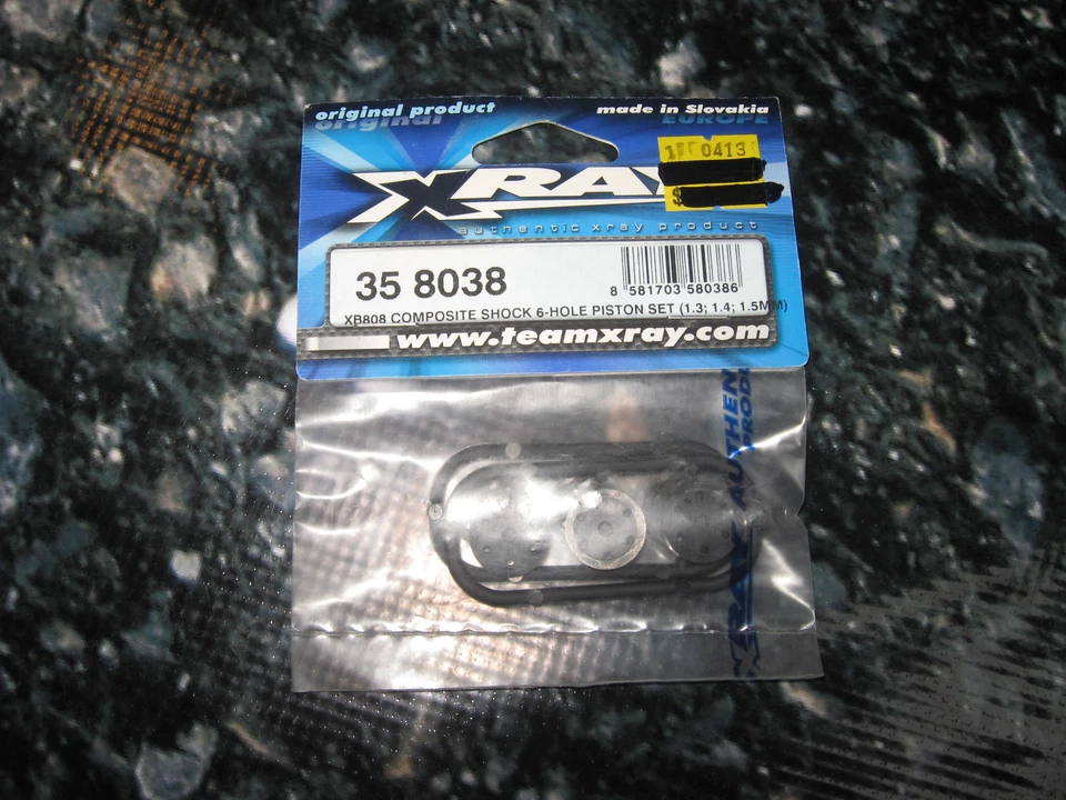 Vintage RC XRAY Piston Set 358038 - Image 1 of 1