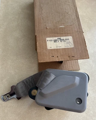 Cinturón de seguridad y retractor gris Ford Escort 1991 1992 nuevo de fábrica (F1CZ-58611B09-CCC) Foto 1 de 4