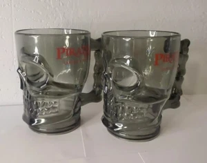 x2 Pirates Voyage Dinner And Show Smokey Grey Acrylic Skull Collectors Cup - Picture 1 of 6