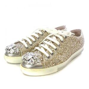 Miu Miu stone embellished lace up glitter sneakers in gold size 37.5 used