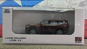 LCD MODELLE TOYOYA LAND CRUISER LC300 ZX 1:64 MASSSTAB NEU IN BOX USA LAGER!!! - Bild 1 von 7