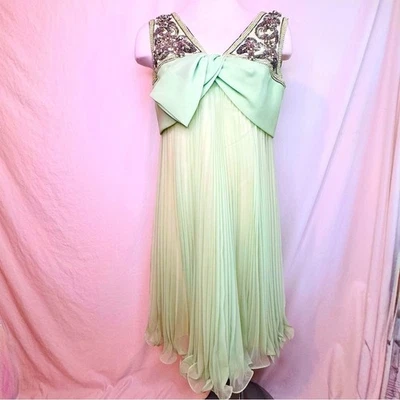 Vestido Jack Bryan años 60 plisado verde menta adornado Foto 1 de 4