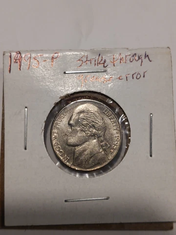 1995 Nickel Major  Strike Through Grease Error . Missing Face Cover