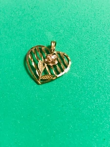 10K YELLOW GOLD DIAMOND CUT HEART PENDANT WITH A DETAILED ROSE - Picture 1 of 5