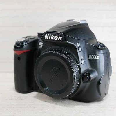 Nikon D3000 10.2MP Digital SLR Camera Body *TESTED* Crack on body SHUTTER 35k - Image 1 of 4