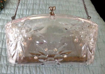 Bolso de mano Lucite de colección de plástico transparente con pedrería en un lado y en el cierre Foto 1 de 2