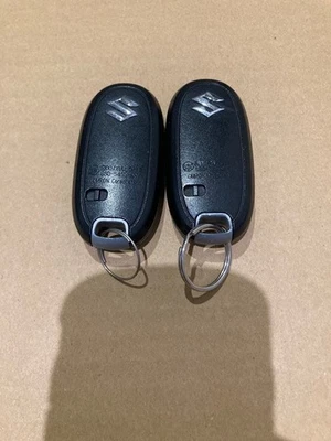 Suzuki Keyless Entry Remote Key Fob Set of 2 Lock/Unlock Buttons Used - Image 1 of 2